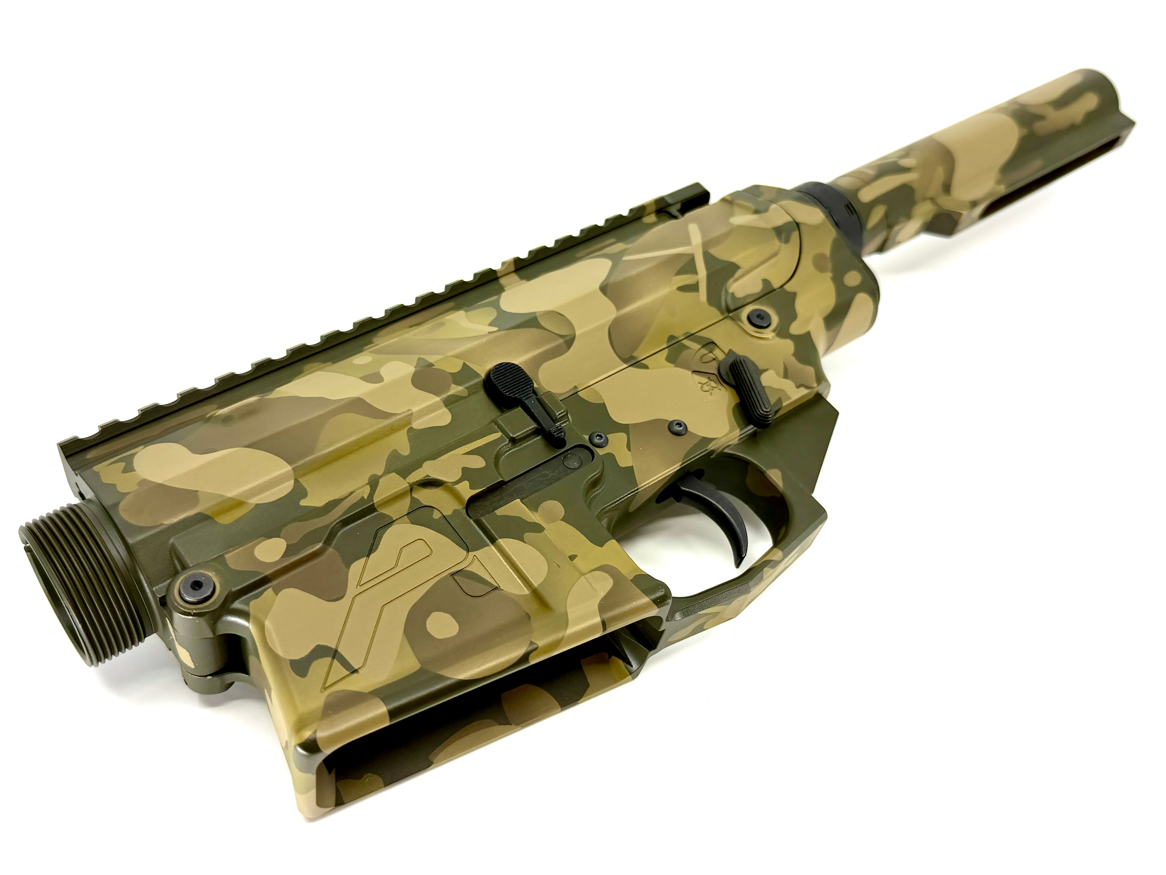 Custom multi-tone camo Cerakote AR lower and upper receiver set — tan, olive, and black pattern on Aero Precision platform by Northwoods Firearms