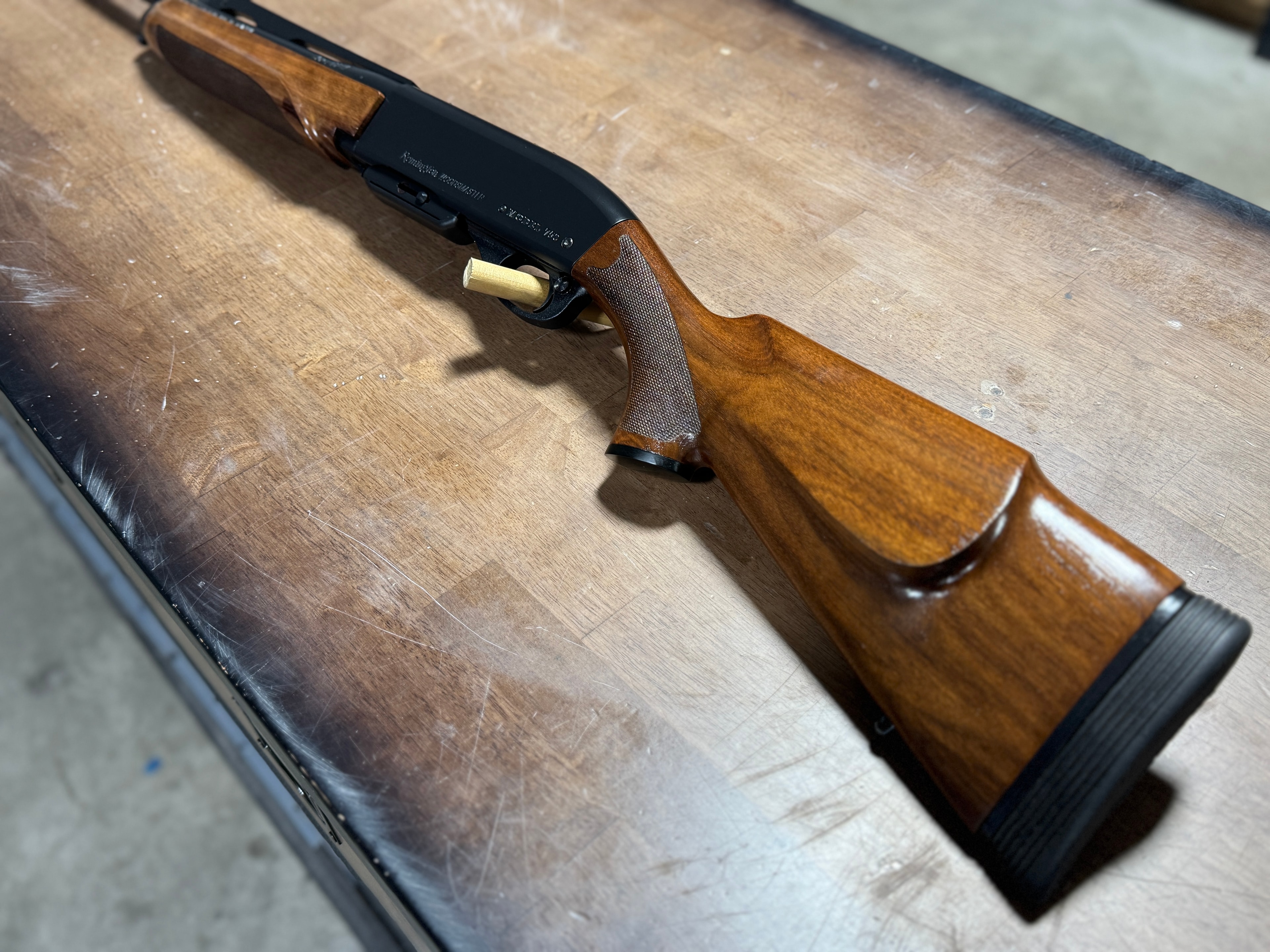 Restored Remington Woodsmaster semi-automatic rifle — stock and receiver detail showing refinished walnut and reblued metal — by Northwoods Firearms, Crandon, WI